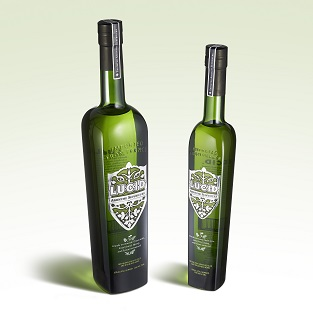 Achievement: Lucid Absinthe. Fidji bottle with a Champagne green shade, engraving and an elegant screen printing combining green, white and gray.